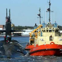 boat and submarine at kings bay submarine base